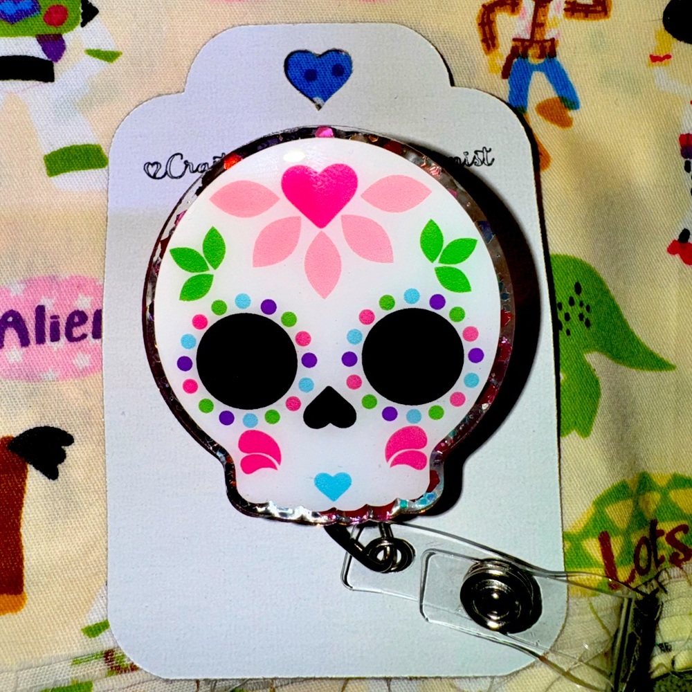 Skull badge reel